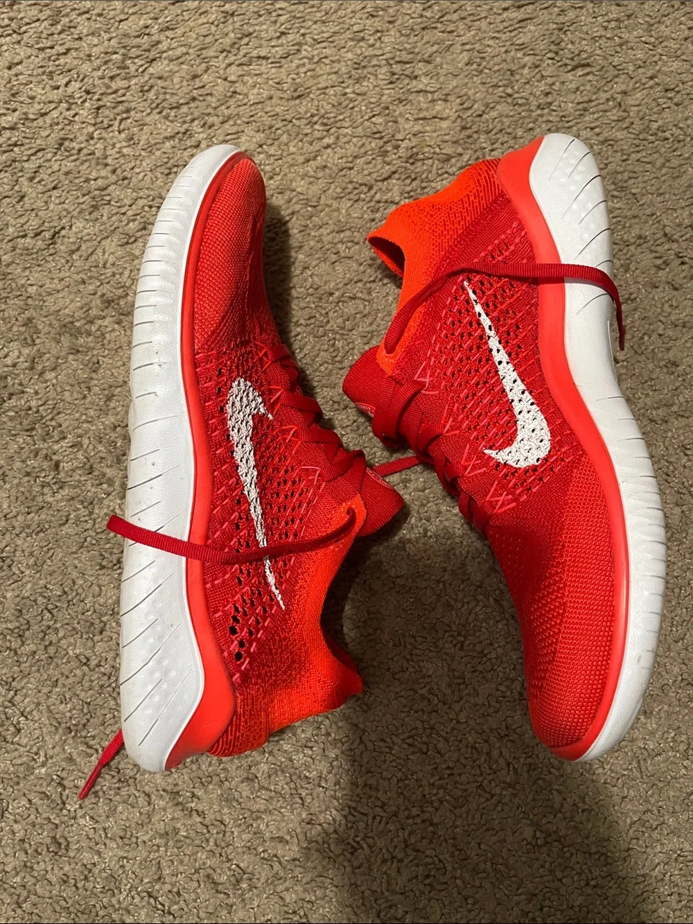 Nike Men’s Red Flyknit Sneakers with White Swoosh